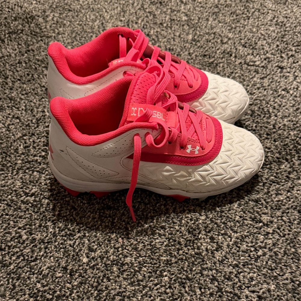 Under Armour Kids' softball cleats in Pink and White